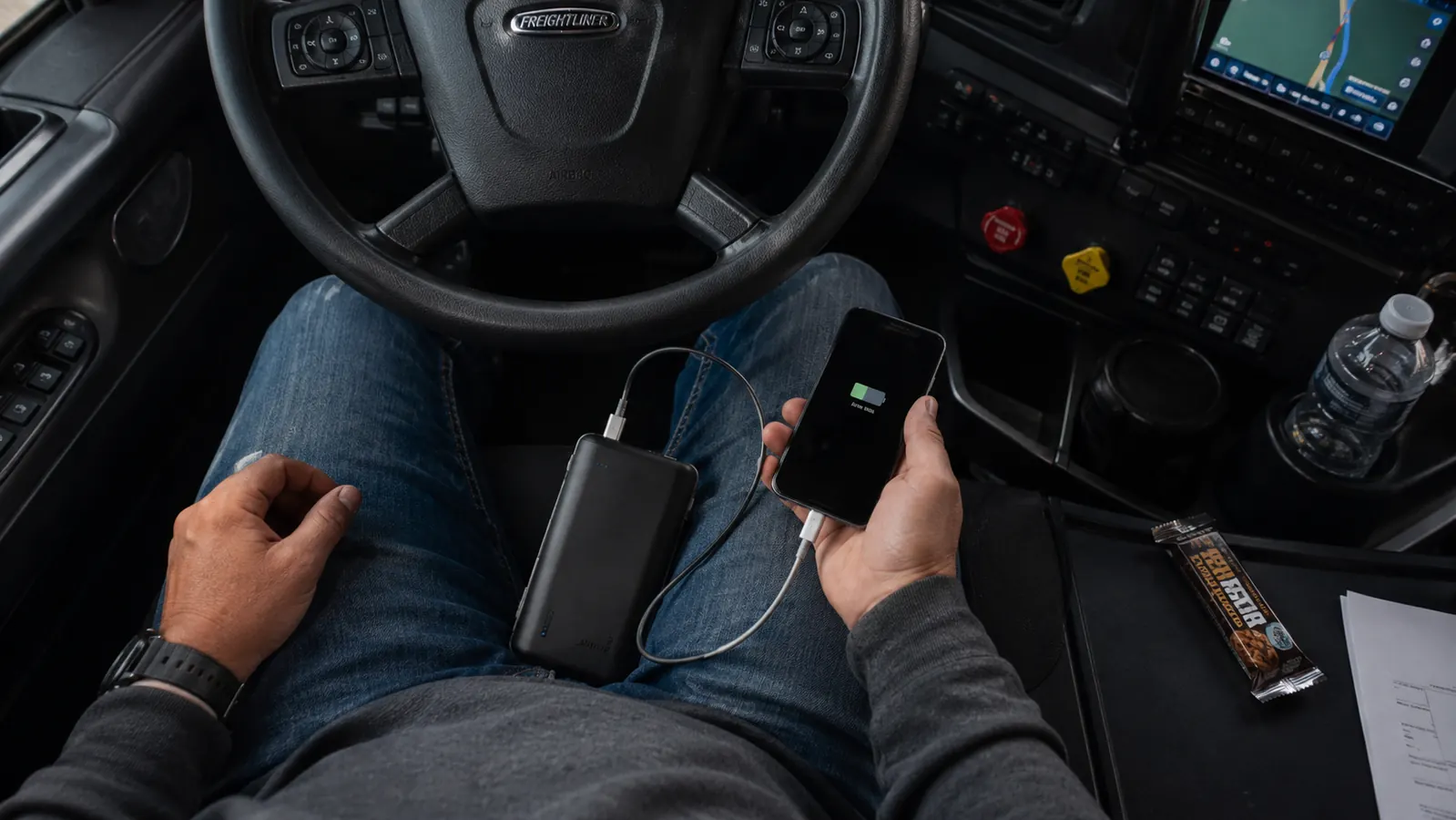 Sunrise over the California desert with a semi-truck on an empty interstate